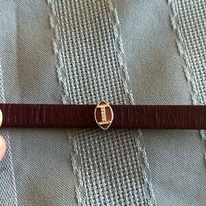 Keep collective football charm with rhinestone laces